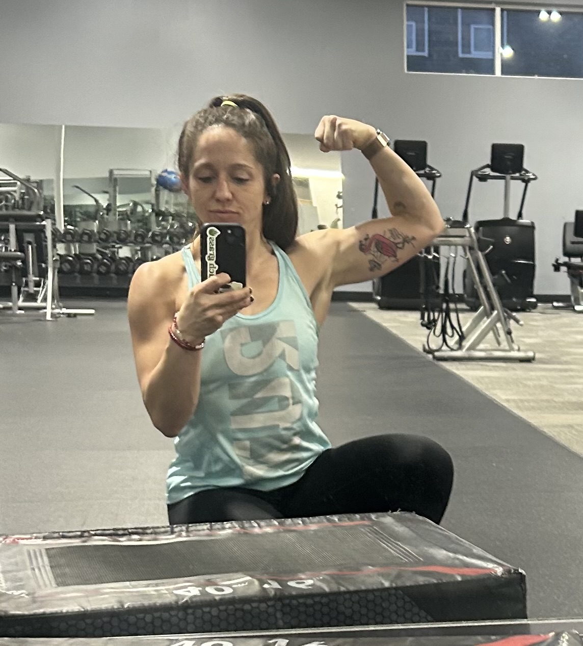 Amanda Large, online strength and nutrition coach, training at the gym